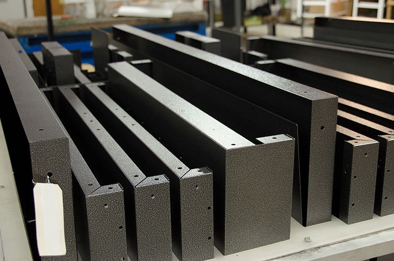 Various assembled angled components are assembled and ready to attached to complete a project.