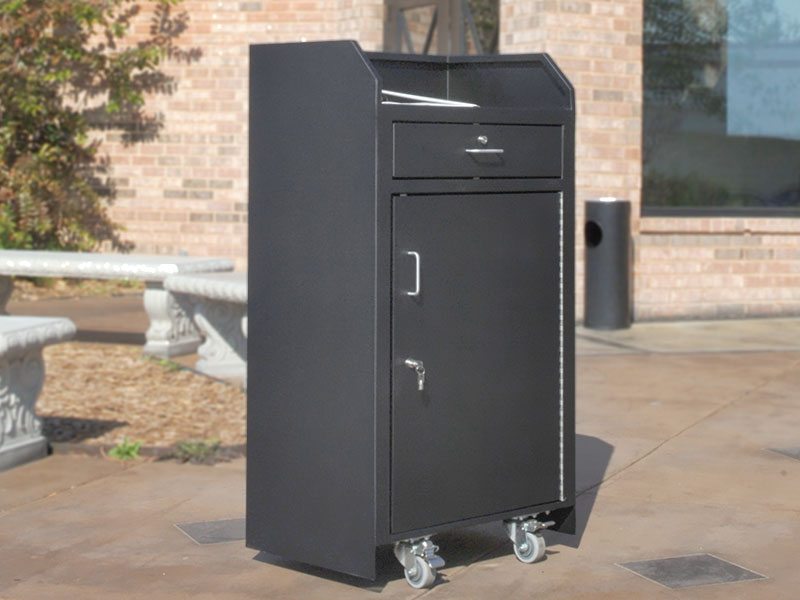 A locked valet key cabinet sits outside a facility.